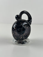 Taikayön Lasipaja – musta lasikissa