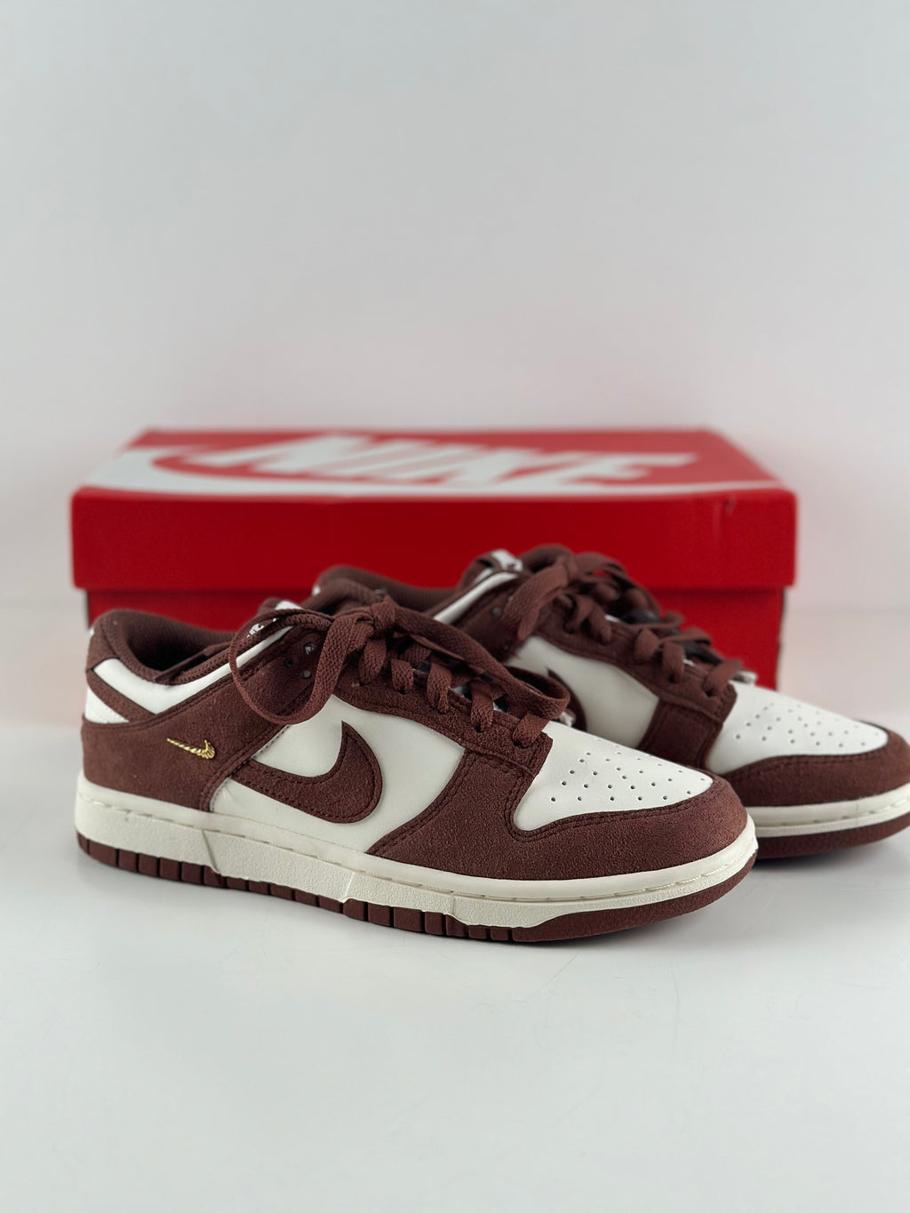 Nike Dunk Low (WMNS) “Sail / Red Sepia / Metallic Gold”