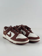 Nike Dunk Low (WMNS) “Sail / Red Sepia / Metallic Gold”