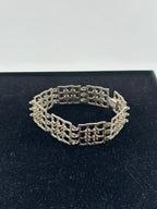 Kultaseppä Salovaara – hopeinen design-rannekoru (925H)