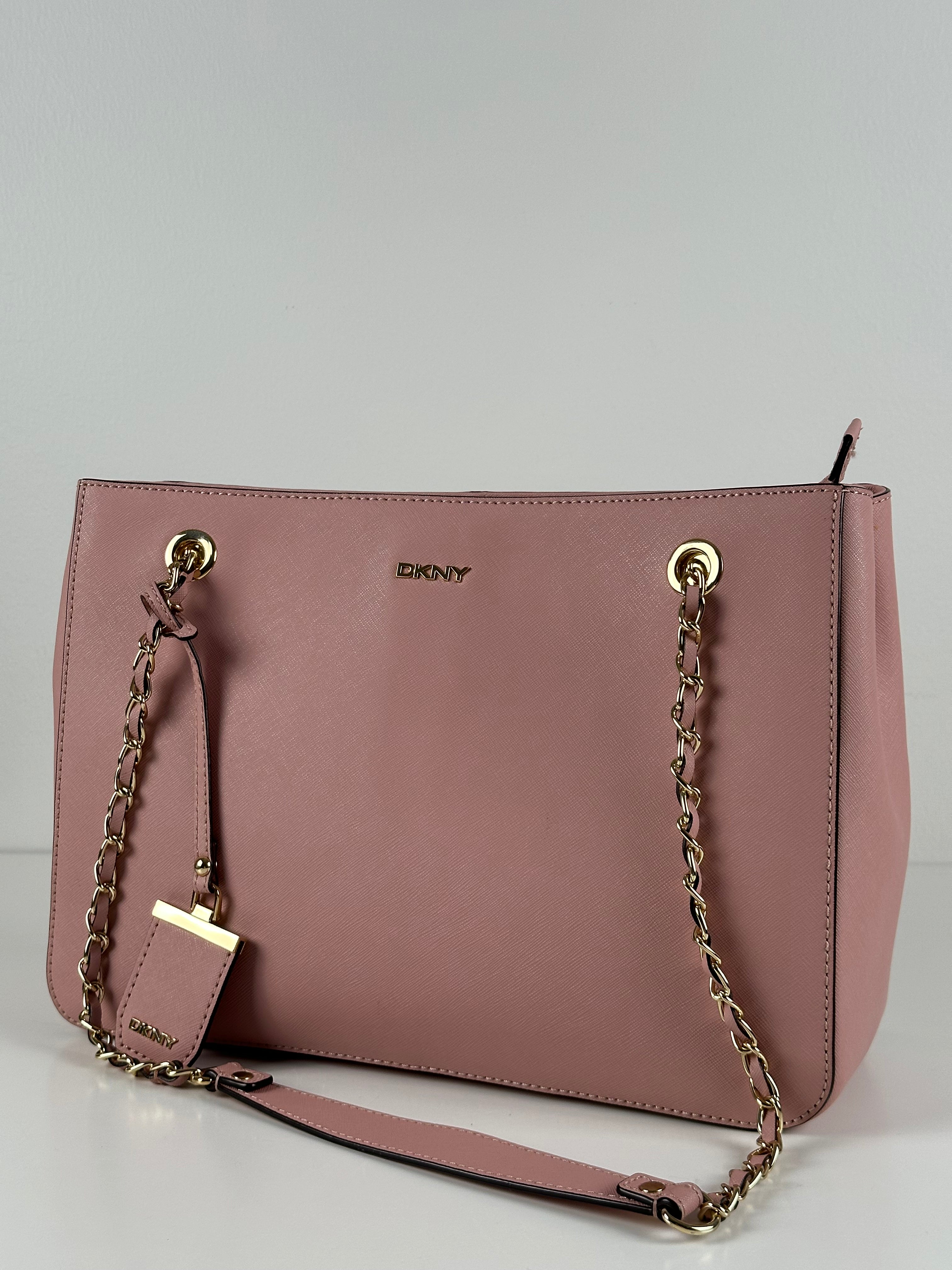 DKNY vaaleanpunainen nahkalaukku