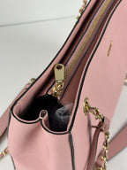 DKNY vaaleanpunainen nahkalaukku