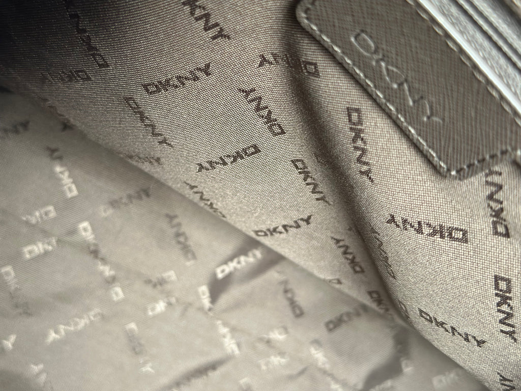 DKNY vaaleanpunainen nahkalaukku