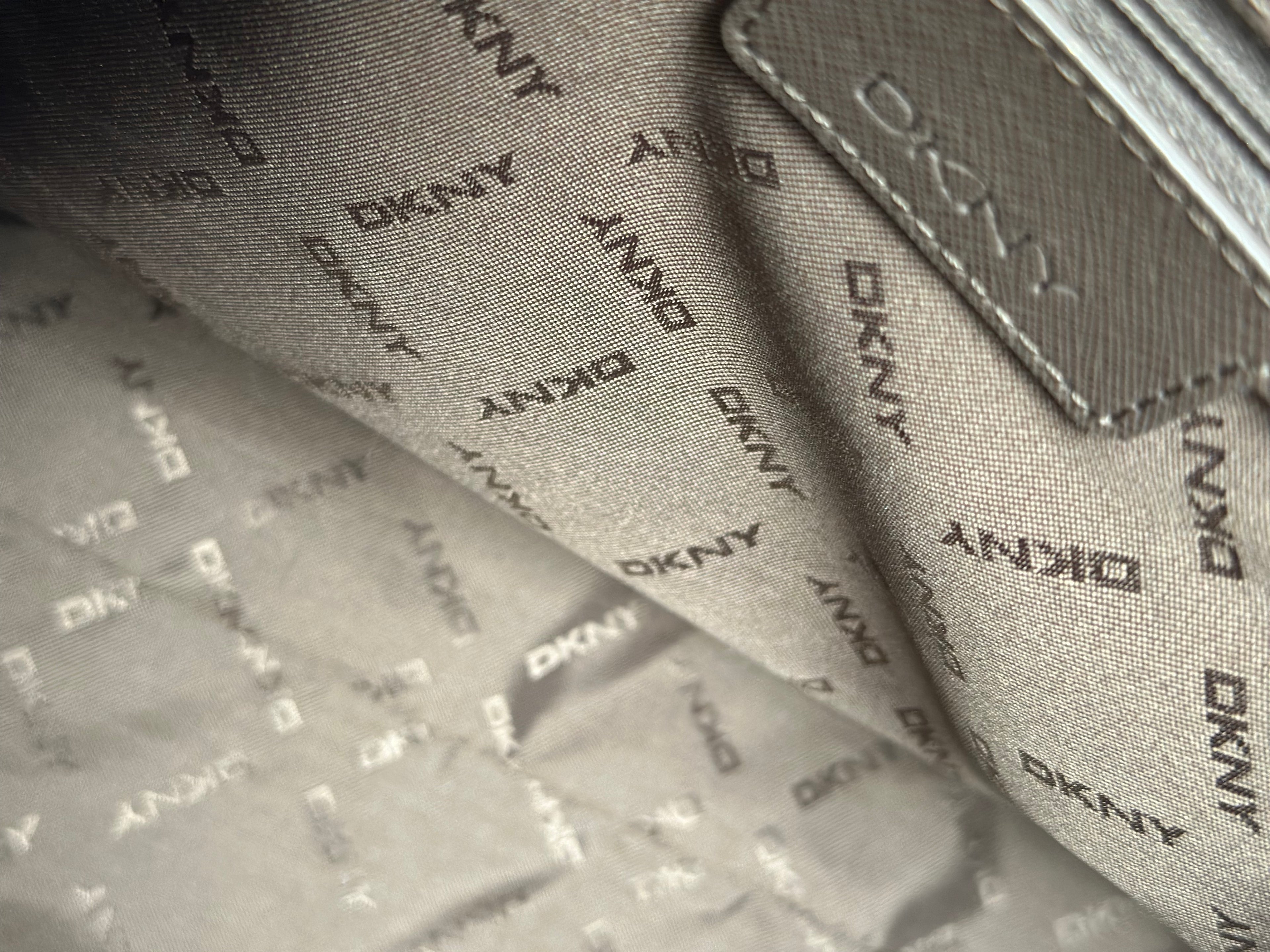 DKNY vaaleanpunainen nahkalaukku