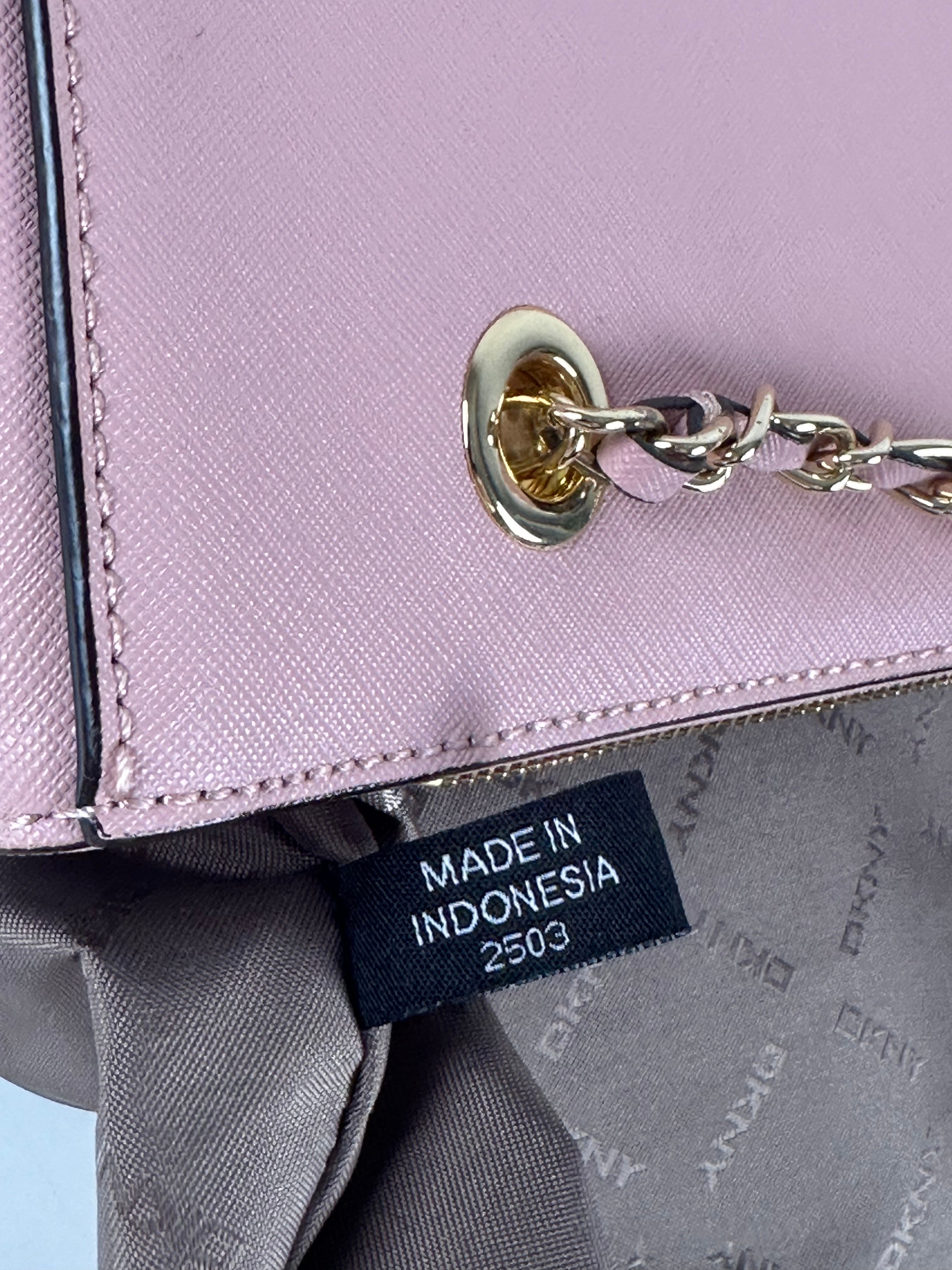 DKNY vaaleanpunainen nahkalaukku