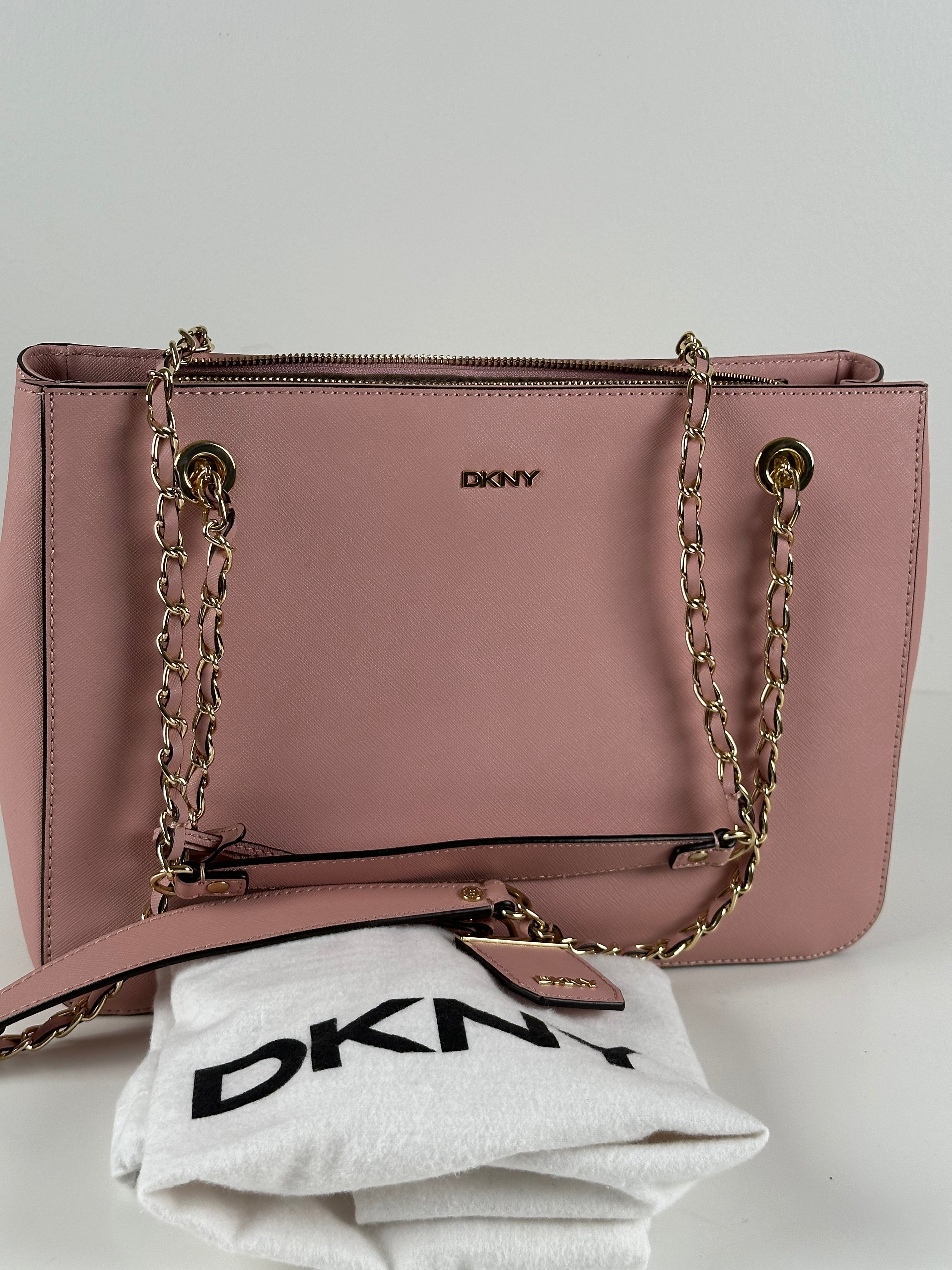 DKNY vaaleanpunainen nahkalaukku