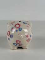 Kukkakuvioinen posliininen säästöpossu